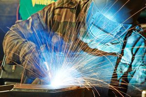 Close up of a welder working on a project. 