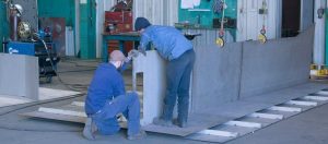 Welders working on a modular skid