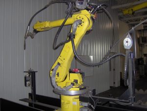 Yellow robotic welding equipment. 